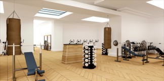 Ein leeres Fitnessstudio mit einem Sprungkasten in der Mitte