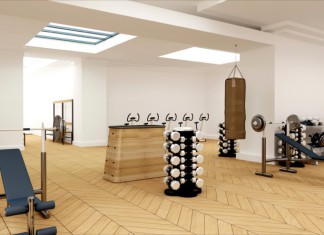 Ein leeres Fitnessstudio mit einem Sprungkasten in der Mitte