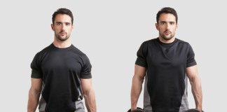 Sportler trainiert Shrugs mit der Kurzhantel - auch Schulterhochziehen genannt